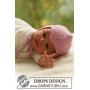 Fairy Rose by DROPS Design - Strickmuster mit Kit Baby-Haube Größen 4-9 Monate